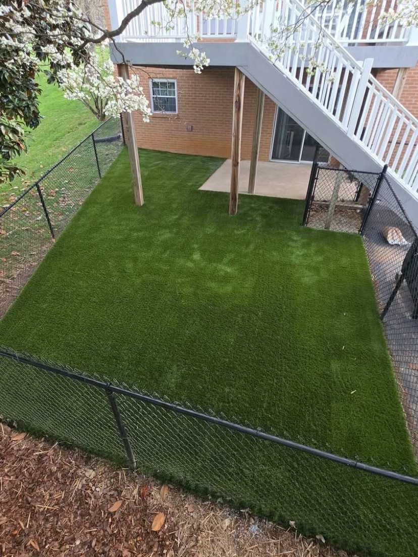 Finished pet turf dog run installed by S & J Synthetic Turf