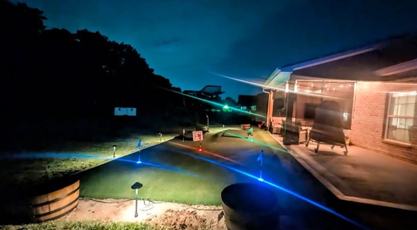 Putting green at night | S & J Synthetic Turf